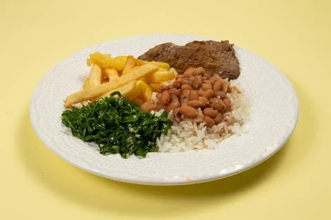 Typical Brazilian basic dish with rice, beans, steak, french fries and braise Stock-Fotos