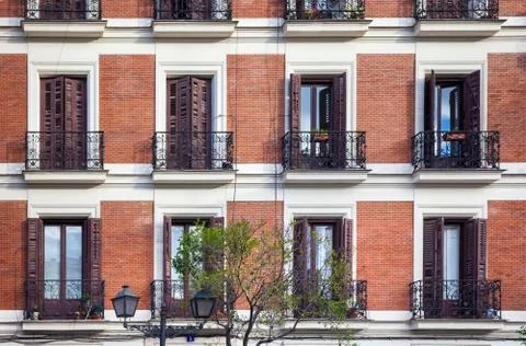 Typical building facade on a spring day in Madrid, Spain Stock Photos