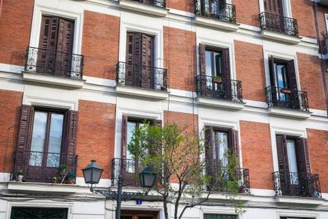 Typical building facade on a spring day in Madrid, Spain Stock Photos
