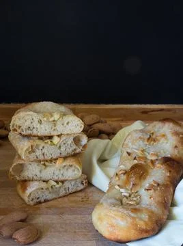Typical Catalan sweet with bread dough, sugar and almonds or pine nuts. 写真素材