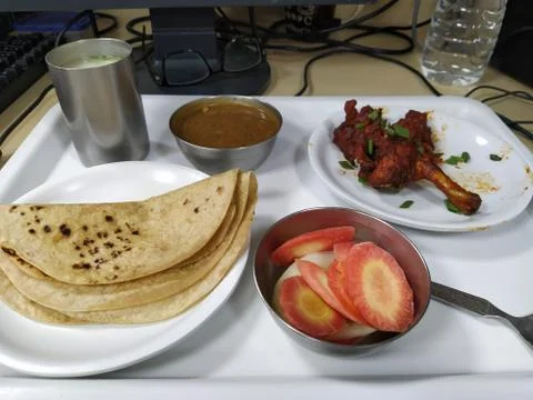 Typical chicken thali provided by the office canteen Stock Photos