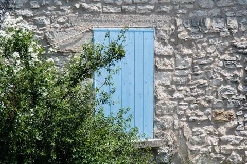 Typical colored window at Moustiers Sainte-Marie in Provence, France Stock Photos
