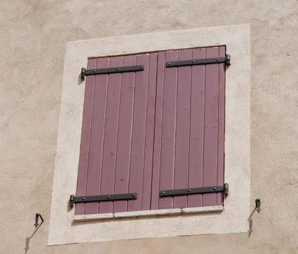 Typical colored window at Moustiers Sainte-Marie in Provence, France Stock Photos