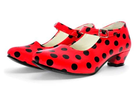 Typical dot-patterned red flamenco shoes Stock Photos