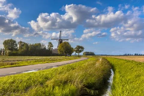Typical dutch landscape windmill Stock Photos