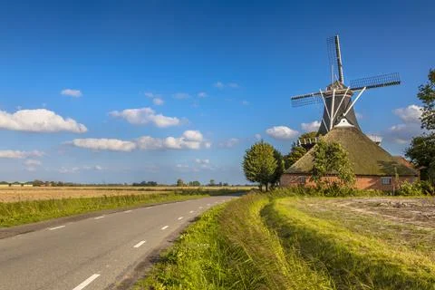 Typical dutch landscape windmill Stock Photos