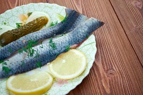 Typical dutch salted herring Photos