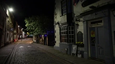 Typical English city at night - slow pan Stock Footage