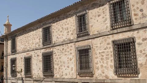Typical faade of a building in the city centre of Segovia. Stock Photos