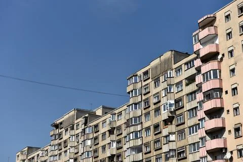 Typical facade of concrete panel building. Post Soviet flat of blocks Stock Photos