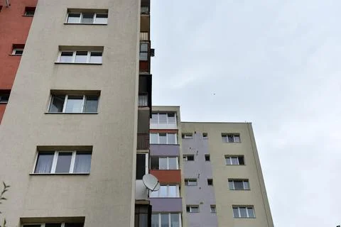 Typical facade of concrete panel building. Post Soviet flat of blocks Stock Photos