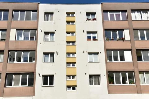 Typical facade of concrete panel building. Post Soviet flat of blocks Stock Photos