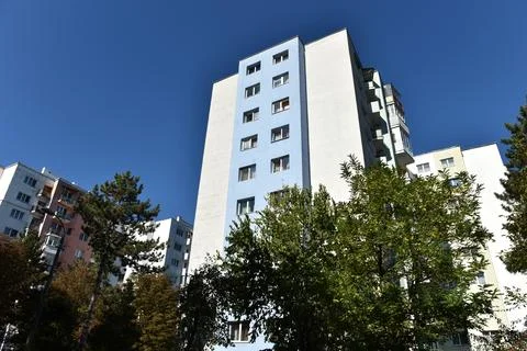 Typical facade of concrete panel building. Post Soviet flat of blocks Stock Photos