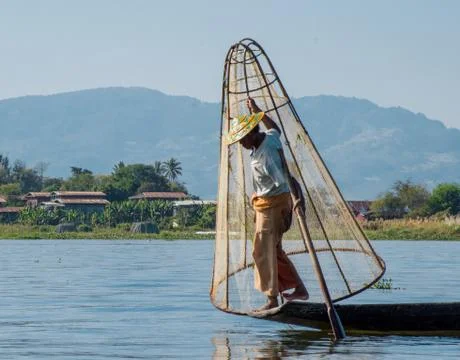 Typical fisherman using a different technique Photos