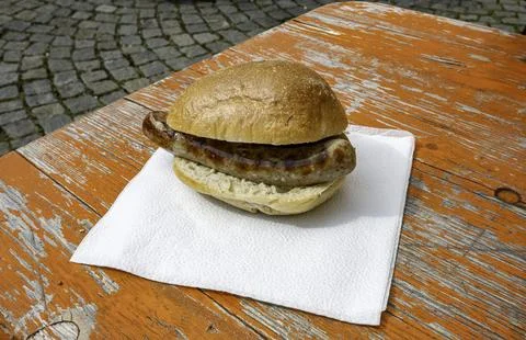 A typical german bread with bratwurst or sausages Stock Photos