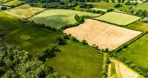 Typical green fields close to the River Erne at Rosscor Bridge in Enniskillen Stock Photos
