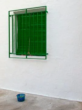 Typical green window outside a home at Alcazar de San Juan Stock Photos
