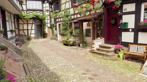 Typical half-timbered houses lined along a pedestrian street in Gengenbach Stock Footage 289000350