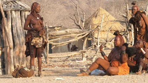 Typical Himba ethnic group, Kaokoland, Namibia, Africa in 4K Stock Footage 90879236