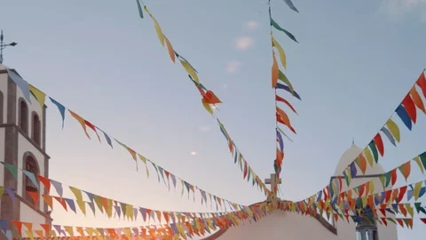 Typical holiday decorations in the square in front of a catholic church in a Stock-Footage 98455845