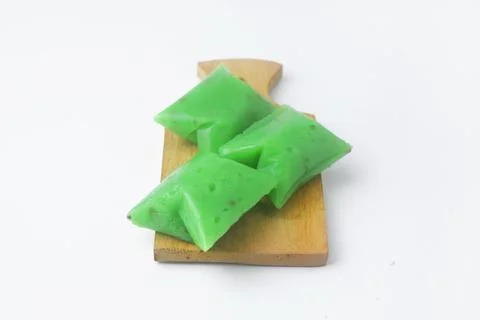 A typical Indonesian snack often called Kue Jentik Manis is on a wooden coast Fotos de archivo