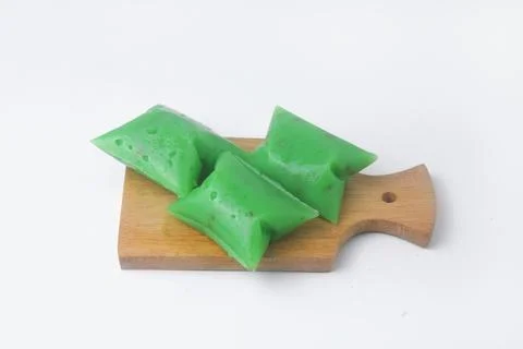 A typical Indonesian snack often called Kue Jentik Manis is on a wooden coast Stock Photos