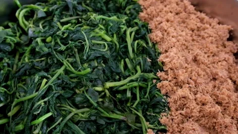 Typical Indonesian spinach mixed with grated coconut Stock Footage 273991372