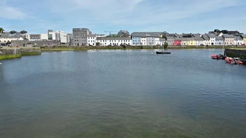 Typical Irish landscape with river and moored boat Stock Footage 278888601
