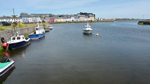 Typical Irish landscape with river and moored boat Stock Footage 278888641