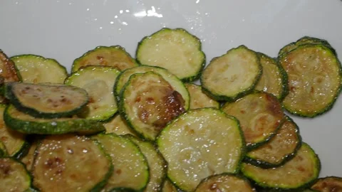 A typical Italian appetizer with sliced fried zucchini. Stock Footage 143110356