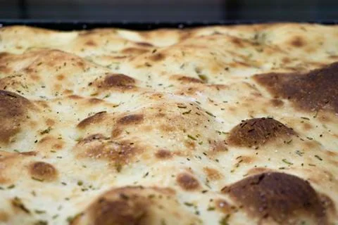 Typical Italian bread starter called Focaccia con rosmarion, close up 스톡 사진
