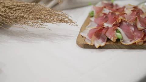 Typical Italian cold cuts on the table Stock Footage 246997298