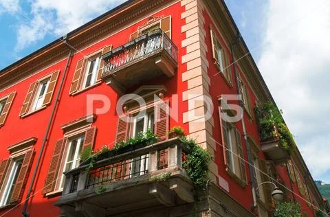Typical italian street in Como town. Stock Photos