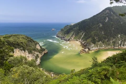 Typical landscape with Playa del Sable near Pesues, Cantabria, Spain Stock Photos