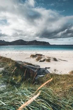 A typical Lofoten beach view frames the sea at Ramberg Lofoten. Scene on a Stock Photos