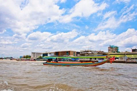 Typical long tail boat down Chao Praya river in Bangkok Stock Photos