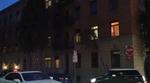 Typical Manhattan Style Apartment Building Establishing Shot at Night Stock Footage