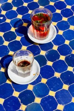 A typical Moroccan mint tea in a small outdoor cafe Stock Photos