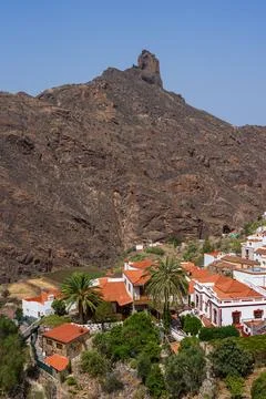 A typical mountain landscape in the central part of the island. In the backgr Stock Photos
