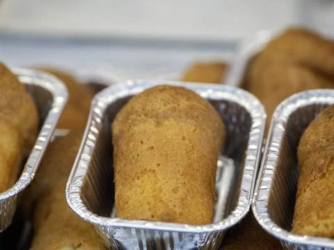Typical napoletan cake called baba in a market Stock Photos
