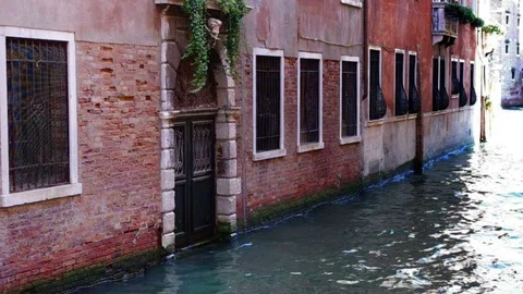 A typical old door on the canal in Venice, Italy Stock Footage 70820091
