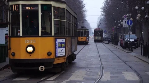 Typical old orange trams in Milan Stock Footage 72786560