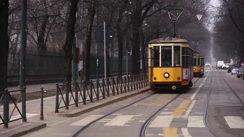 Typical old orange trams in Milan Stock Footage 72786609