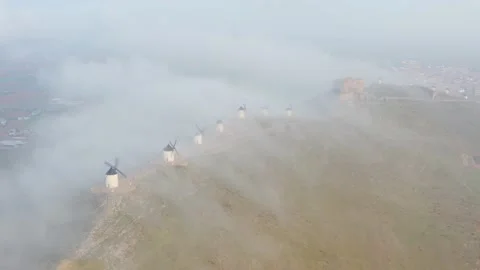 Typical old white Spanish windmills (Molinos appearing in Don Quijote) Stock Footage 175659246