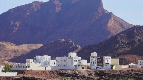 Typical Omani Architecture with Mountains in Background. Standard White Arabian Stock Footage 124461886