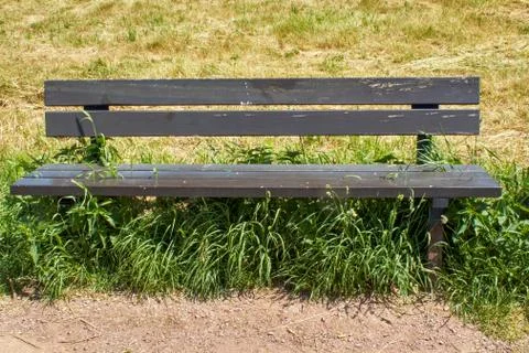 Typical park bench of the former GDR Stock Photos
