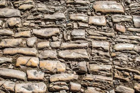 A typical pavement lined with cobblestones of a rectangular shape. Omodos. Cypru Stock Photos