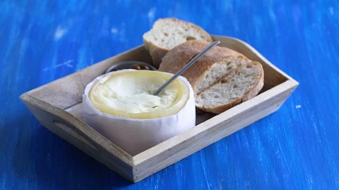 Typical portuguese cheese with bread and olives Stock Footage 105872724