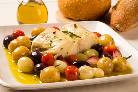 A typical Portuguese dish with codfish called Bacalhau do Porto. Stock Photos
