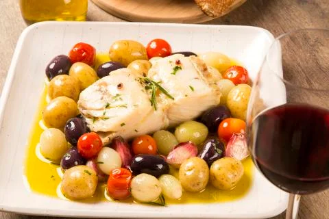 A typical Portuguese dish with codfish called Bacalhau do Porto. Stock Photos